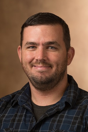 A portrait photo of Dr. Corey Ragsdale