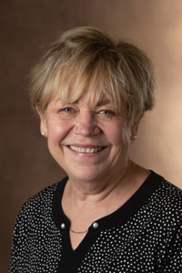 A portrait photo of Carole Frick